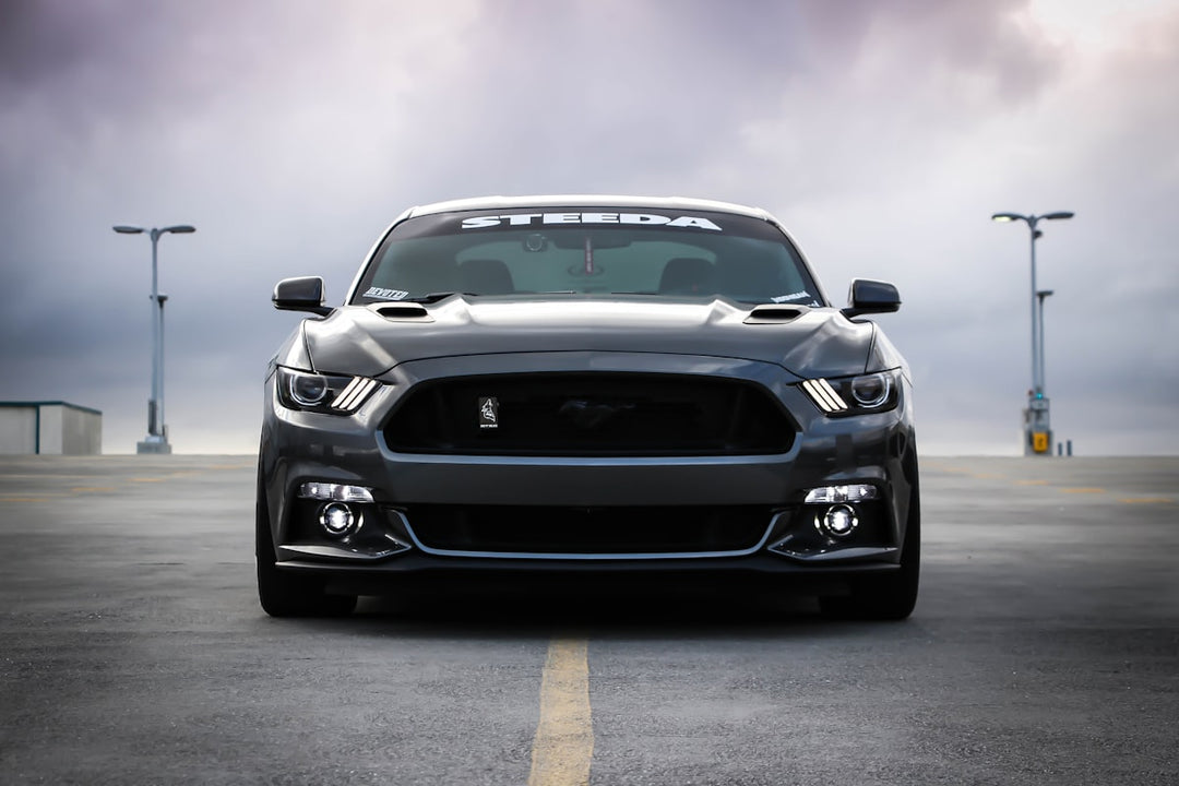 Premium aftermarket wheels from top brands displayed on vehicles